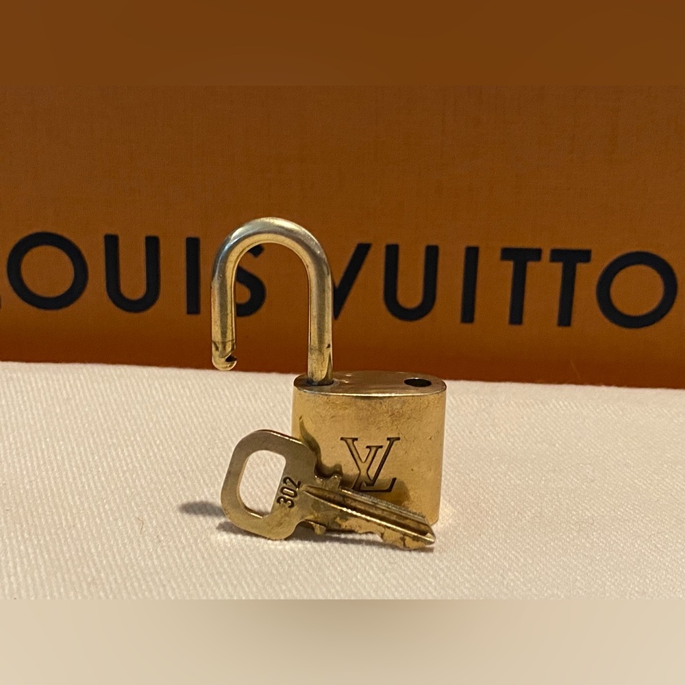 Louis Vuitton Gold Padlock and Key Set
